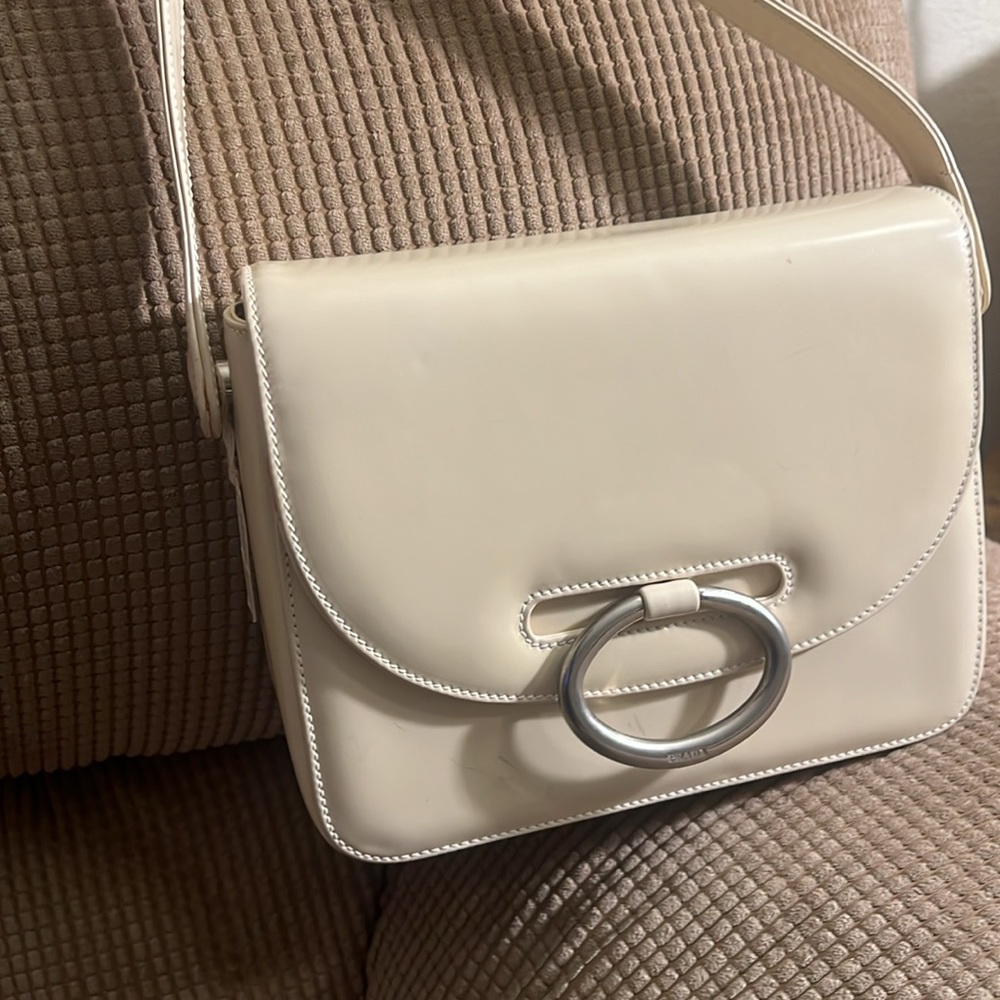 White Prada shoulder bag with authenticity card